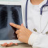 Doctor using tablet computer